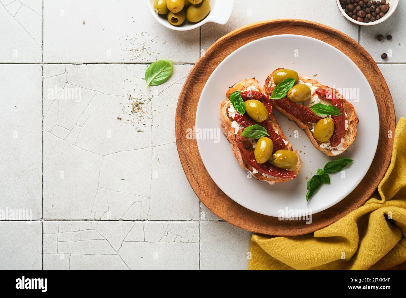 Bruschetta with sun dried tomatoes. Toast or sandwich with ricotta, sun