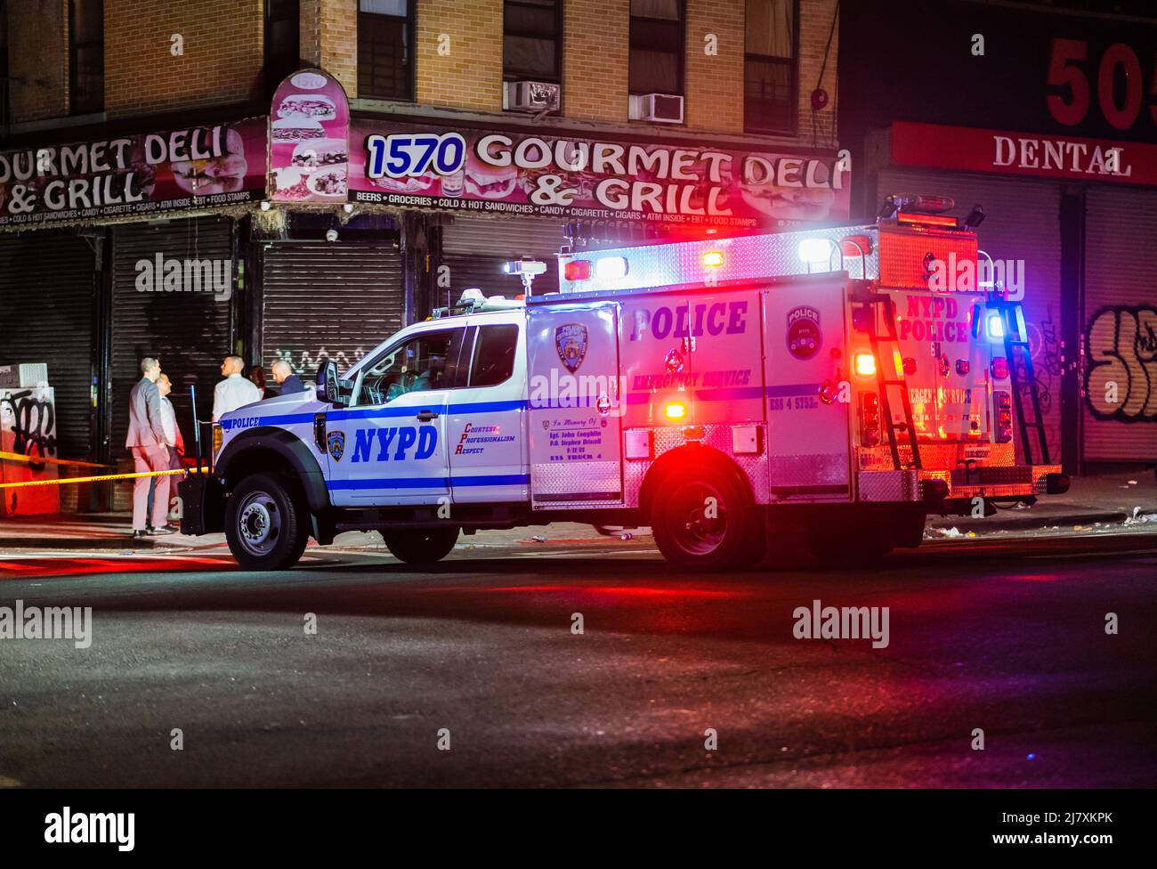 Police are investigating the scene where two police officers from the 42nd Precinct exchanged