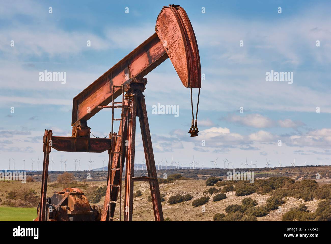 Oil pumping machine platform. Pump jack. Petroleum extraction. Resource Stock Photo
