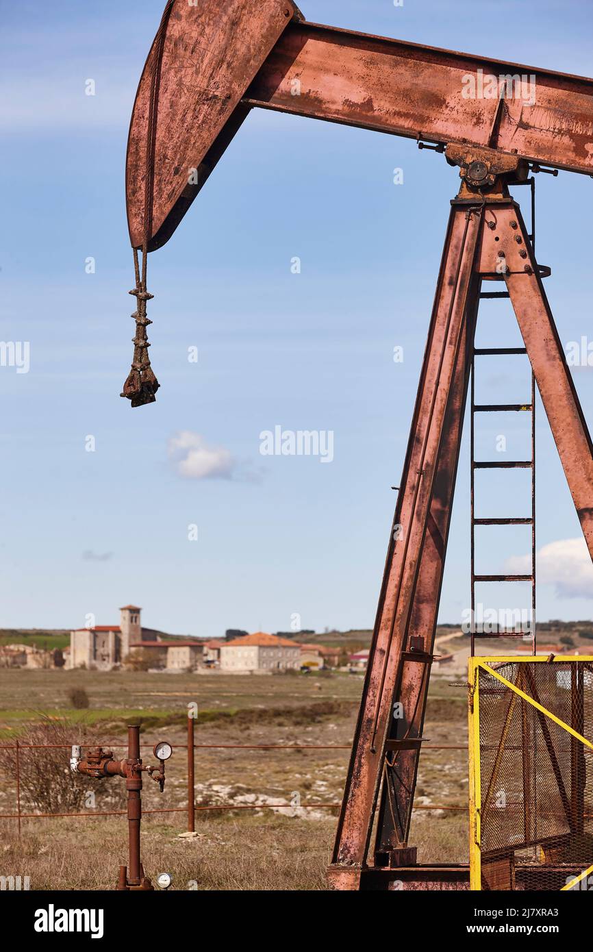 Oil pumping machine platform. Pump jack. Petroleum extraction. Resource Stock Photo