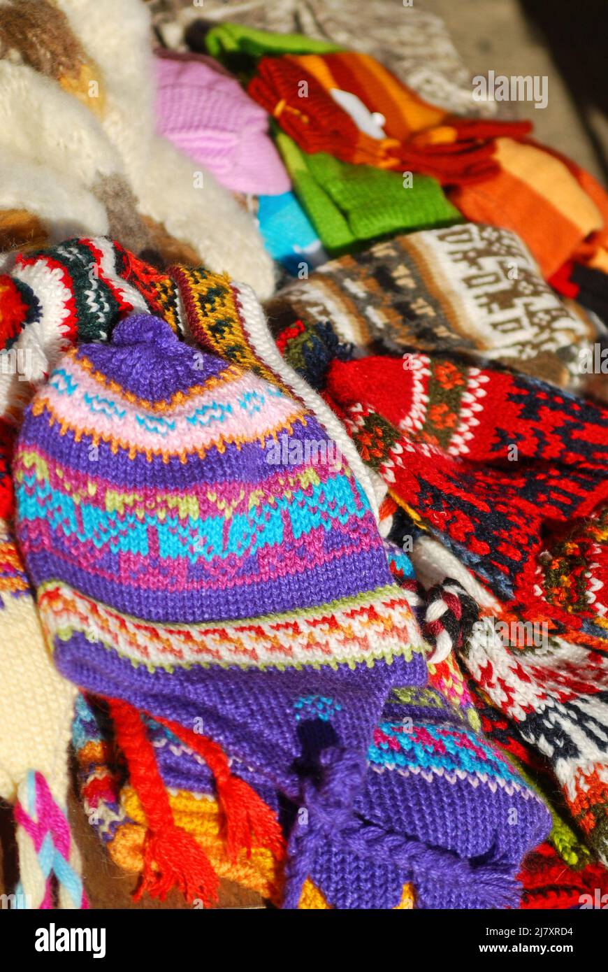 Group of colorful Chilean snow caps for sale at Chiloe market. Stock Photo