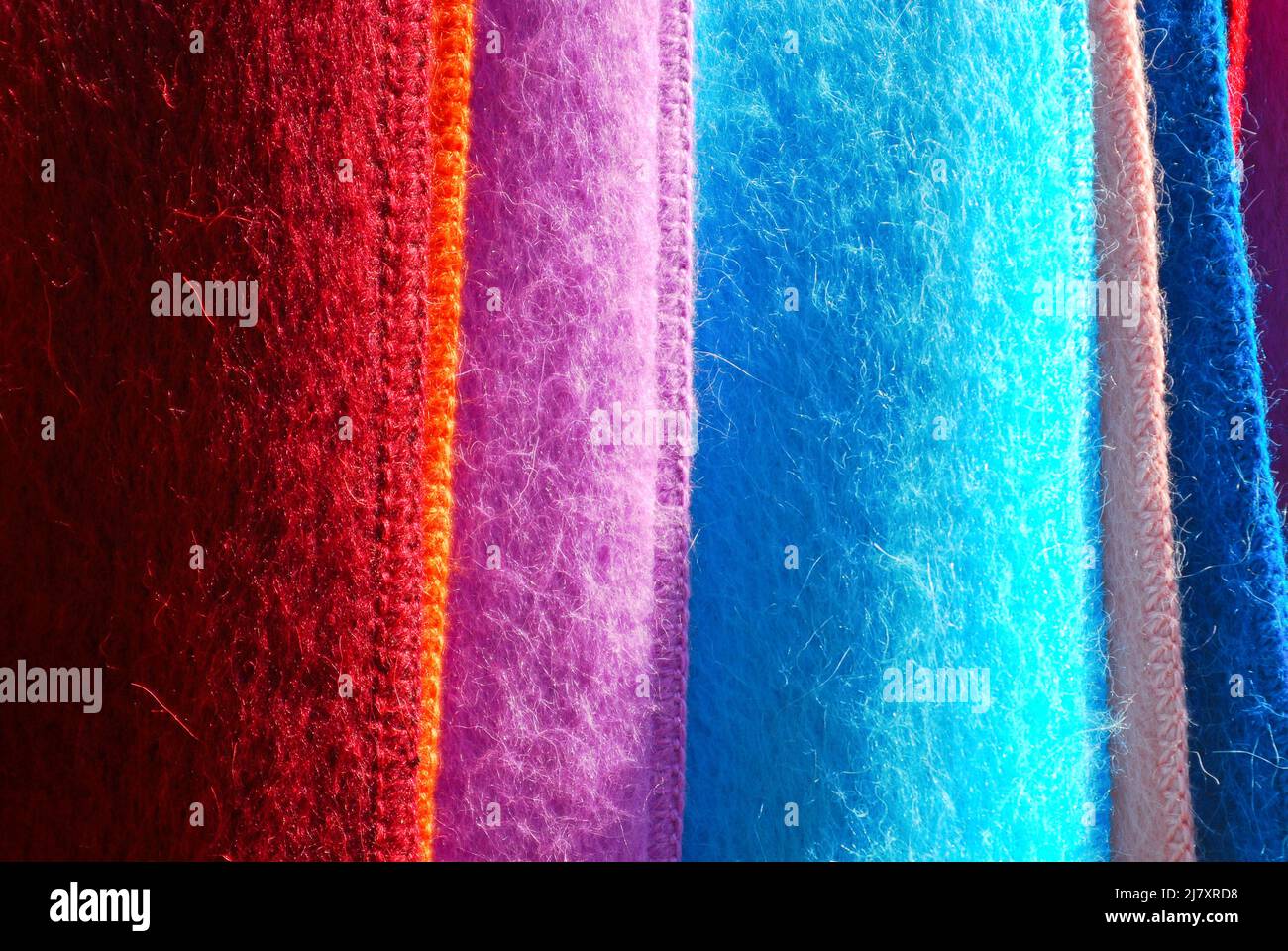 Close-up of variously colored Andes alpaca wool scarves for sale in a market in southern Chile Stock Photo