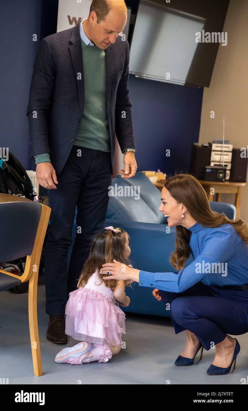 The Duke and Duchess of Cambridge speak to Olivia Wilson, two, during a visit to the Wheatley Group in Glasgow, to hear about the challenges of homelessness in Scotland. Picture date: Wednesday May 11, 2022. Stock Photo