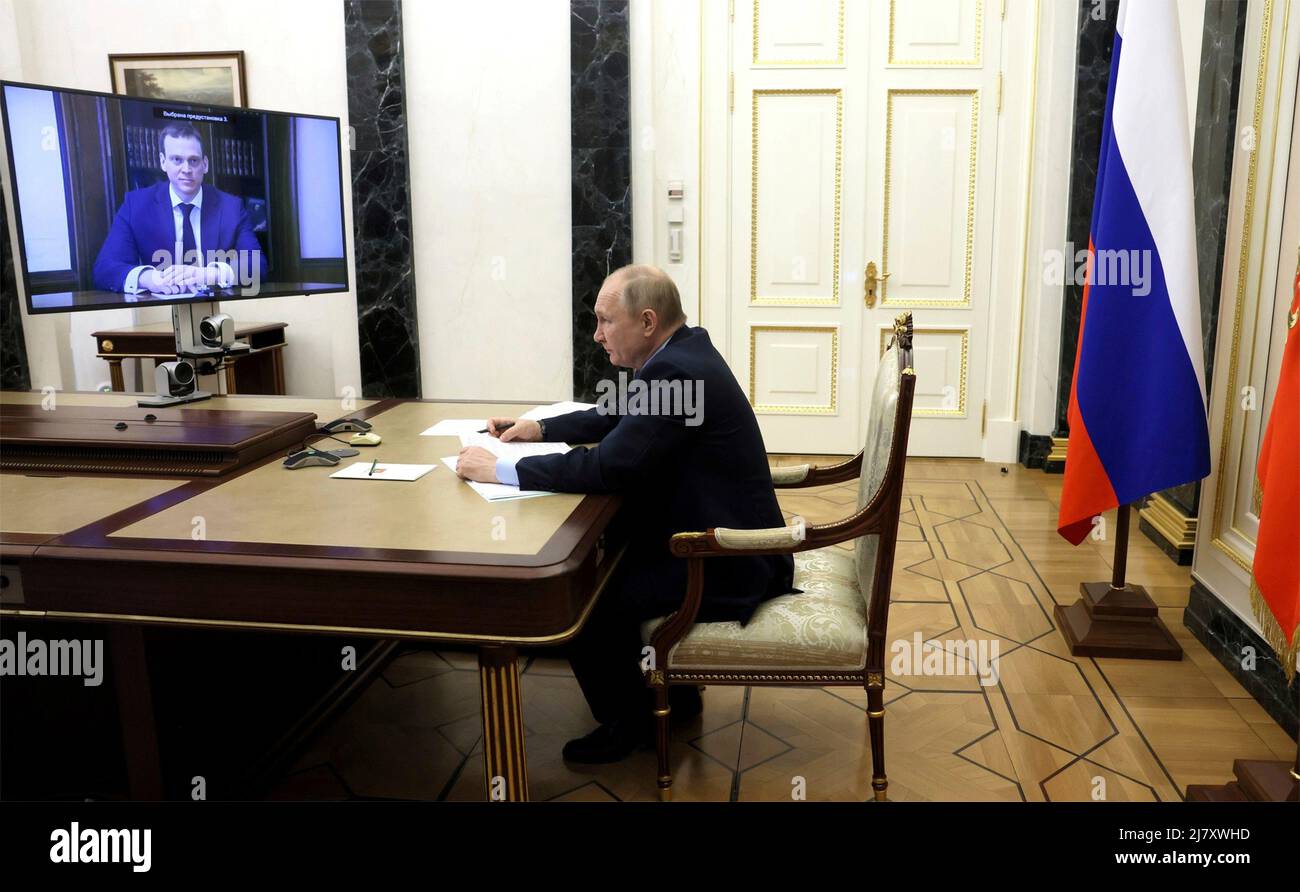 Moscow, Russia. 10th May, 2022. Russian President Vladimir Putin holds a video conference meeting to appoint Pavel Malkov the acting Governor of the Ryazan Region, from the Kremlin, May 10, 2022 in Moscow, Russia. Credit: Mikhail Metzel/Kremlin Pool/Alamy Live News Stock Photo