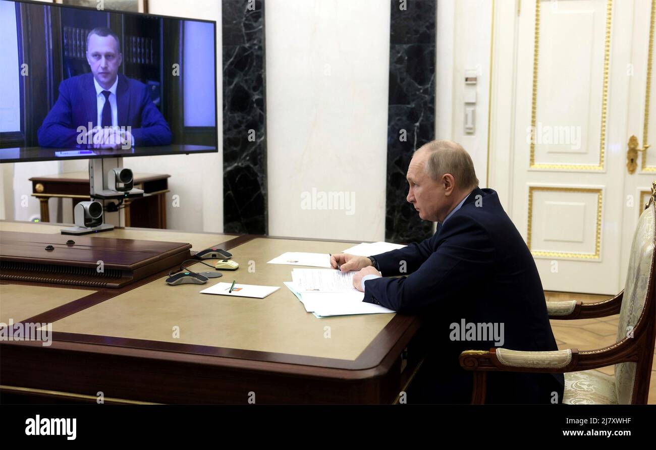 Moscow, Russia. 10th May, 2022. Russian President Vladimir Putin holds a video conference meeting to appoint Roman Busargin as the acting Governor of the Saratov Region, from the Kremlin, May 10, 2022 in Moscow, Russia. Credit: Mikhail Metzel/Kremlin Pool/Alamy Live News Stock Photo