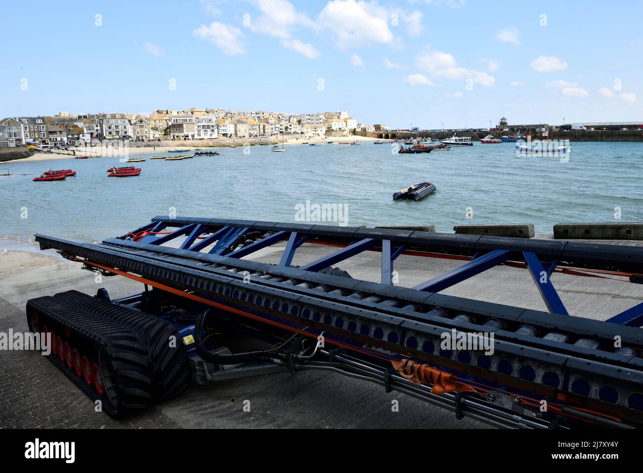 Lifeboat Recovery System with St Ives in the background Cornwall England uk Stock Photo