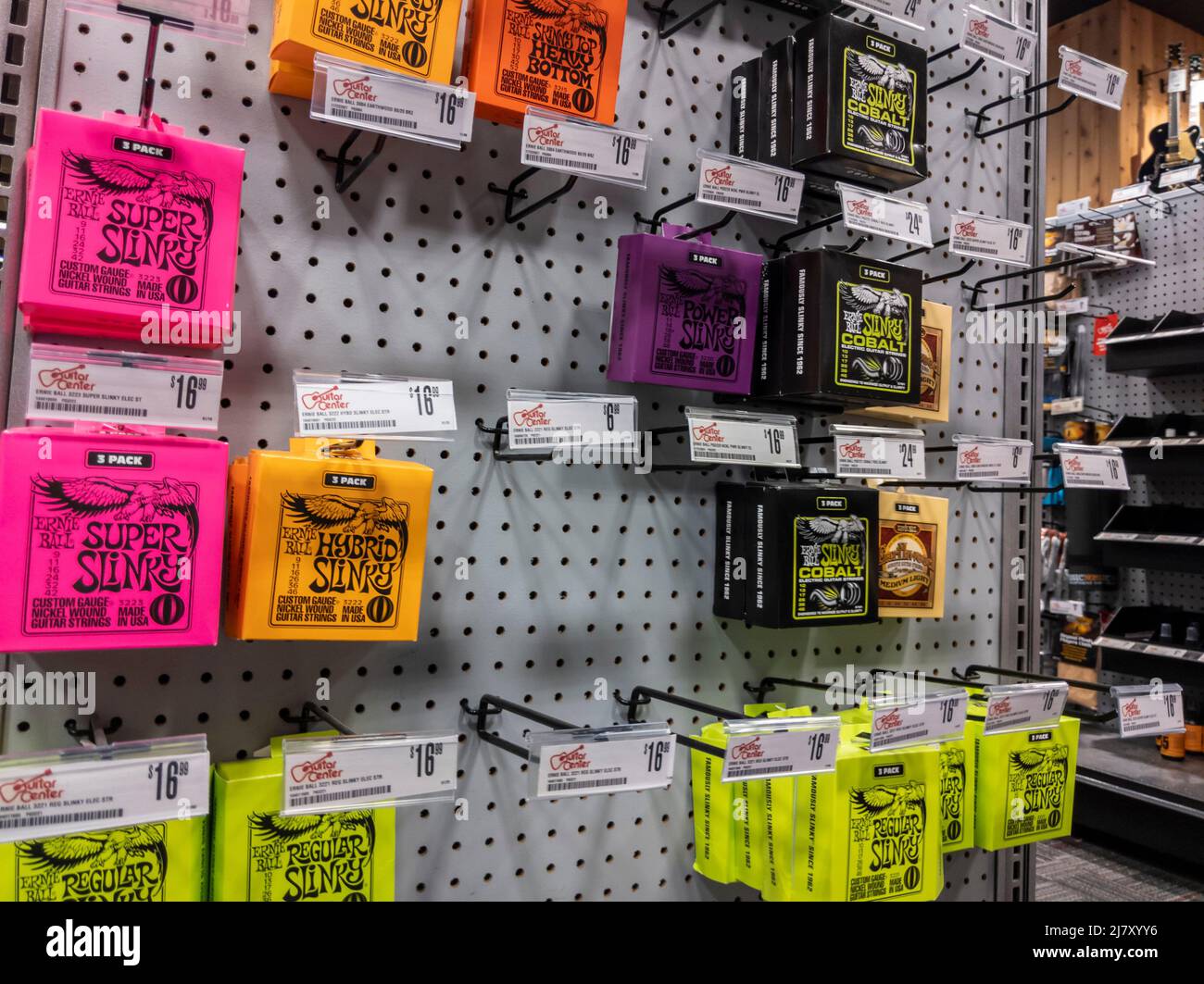 Lynnwood, WA USA - circa May 2022: Angled view of guitar strings for sale inside a Guitar Center musical instrument store Stock Photo