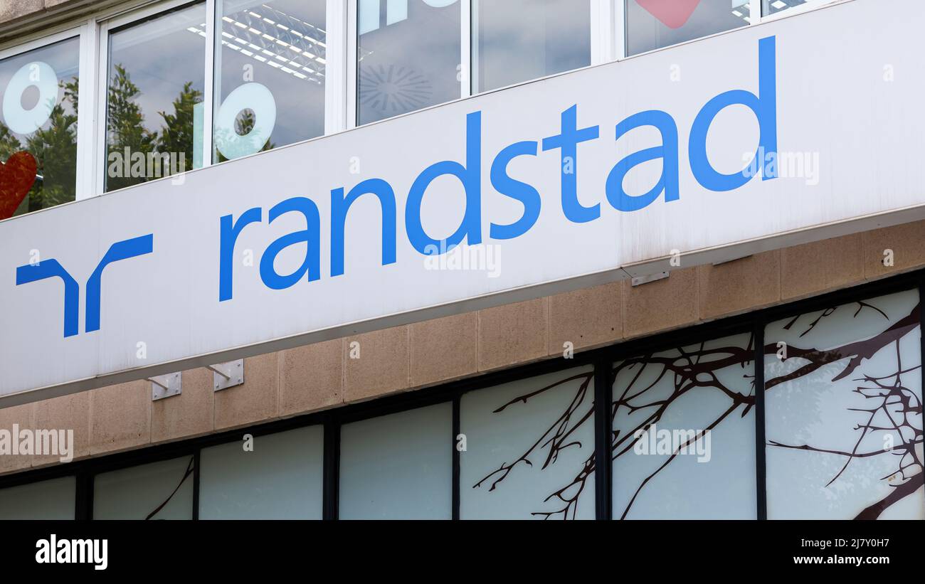 VALENCIA, SPAIN - MAY 05, 2022: Randstad is a Dutch multinational human resource consulting firm Stock Photo