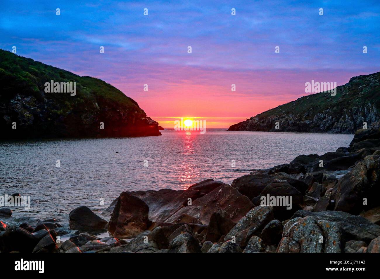Sunset at Port Quin beach on the North Cornwall Coast. Stock Photo