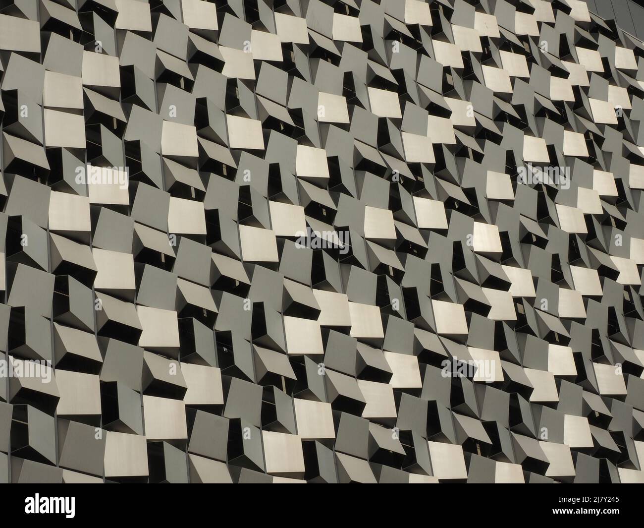 kaleidoscopic details of angular 3D modernist cladding on modern high ...