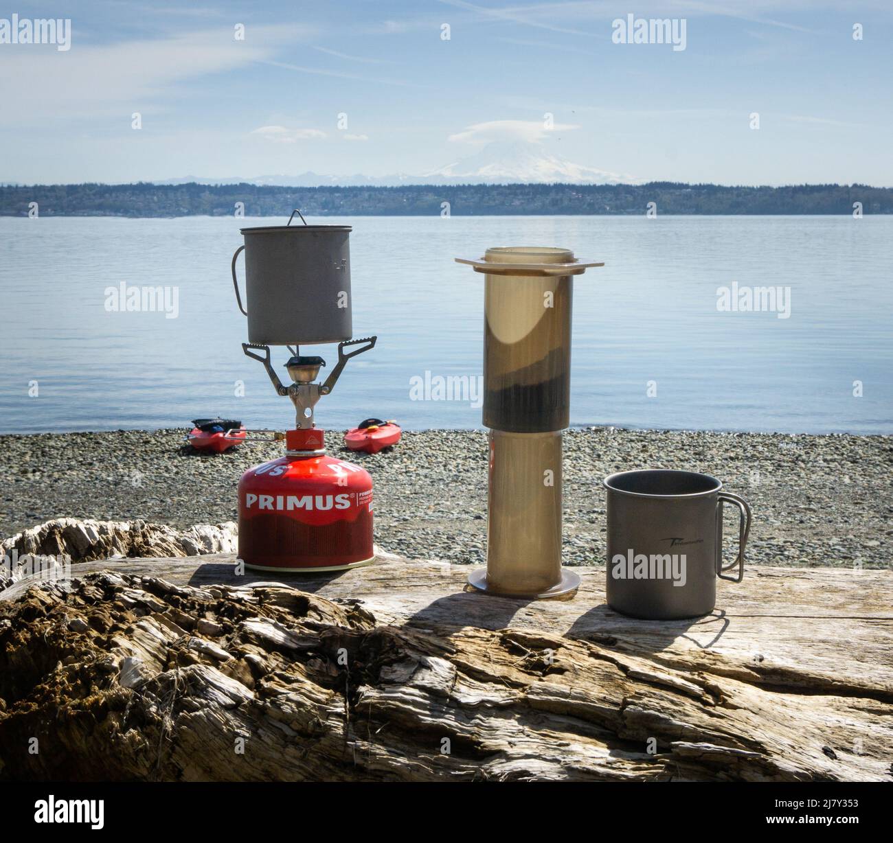 Using an Aeropress to make coffee on the shore of Vashon Island Stock