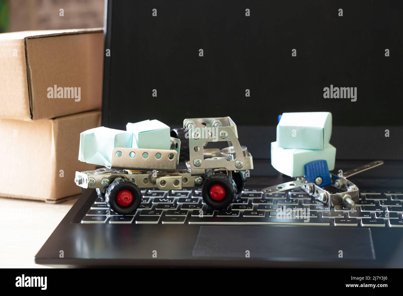 Shipping, delivery and logistic concept. Truck and plane and cardboard