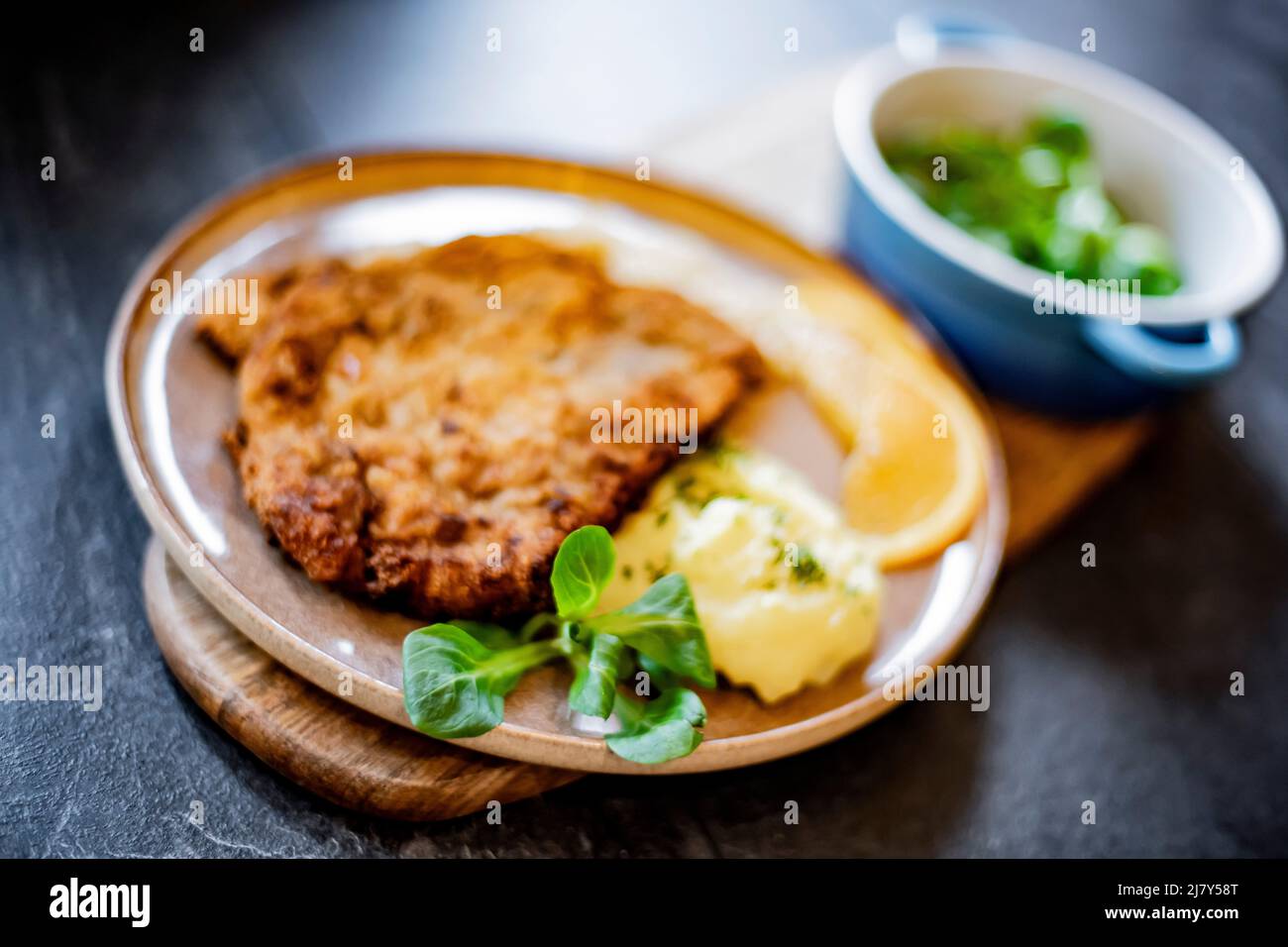 Pork breaded cutlet coated with breadcrumbs with mashed potatoes and