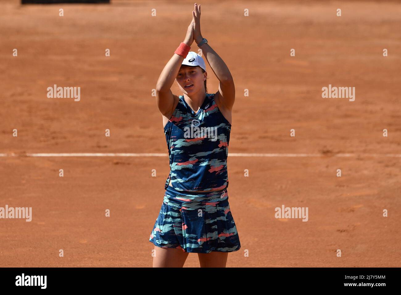 Rome, Italy. 11th May, 2022. Iga Swiatek of Poland returns to Elena Gabriela Ruse of Romania during their second round match at the Internazionali BNL D'Italia tennis tournament at Foro Italico in Rome, Italy on May 11th, 2022. Photo Antonietta Baldassarre/Insidefoto Credit: insidefoto srl/Alamy Live News Stock Photo