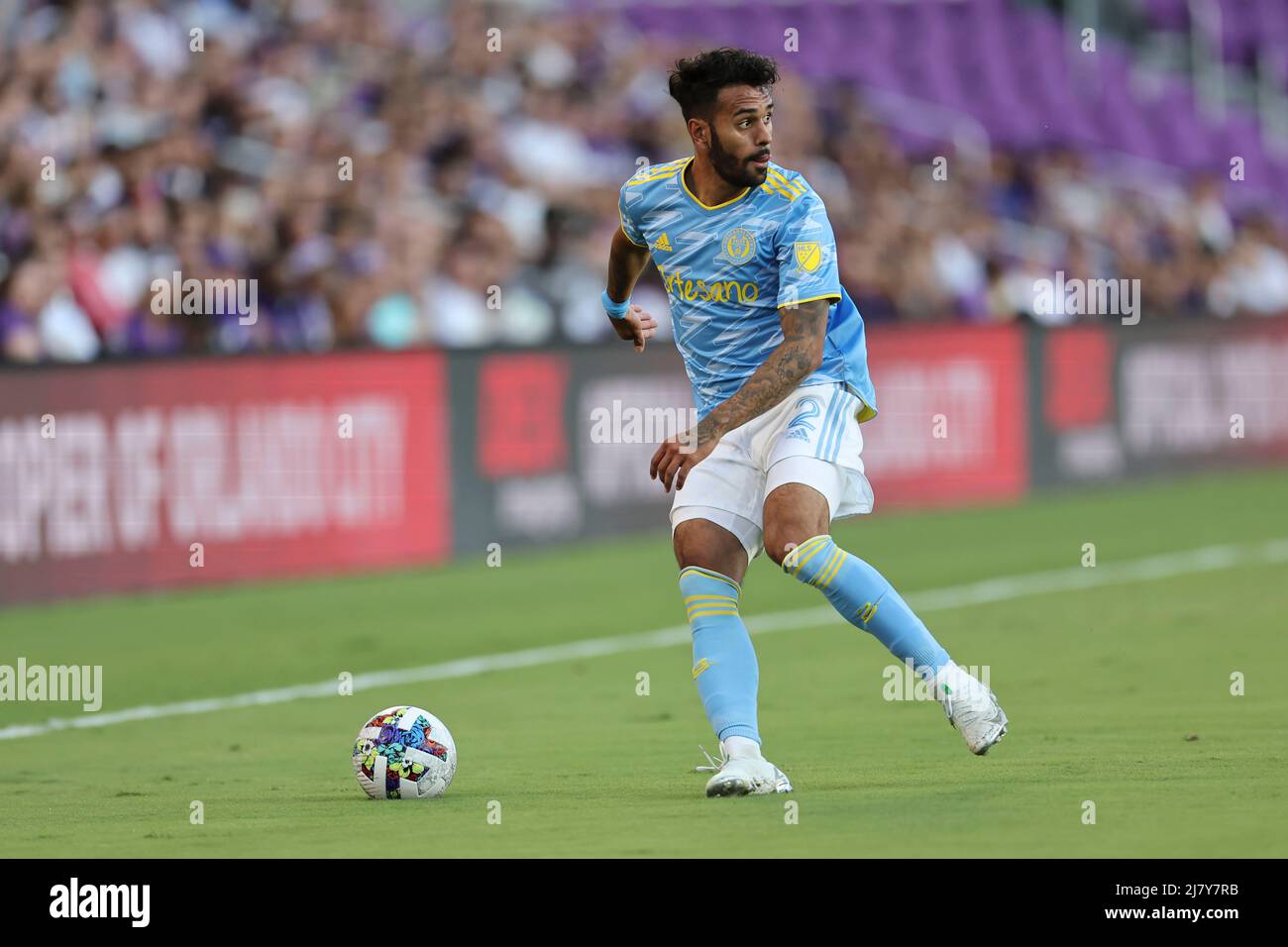 Orlando, FL:  Philadelphia Union defender Matt Real (2) carries the ball up the pitch during the round of 32 game of the Lamar Hunt U.S. Open Cup agai Stock Photo