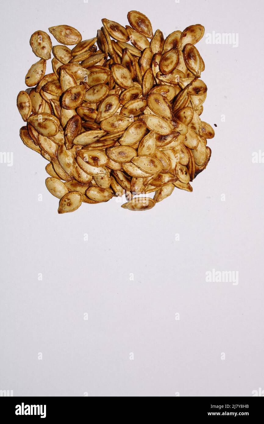 Fresh Roasted Pumpkin Seeds Isolated on White Stock Photo Alamy