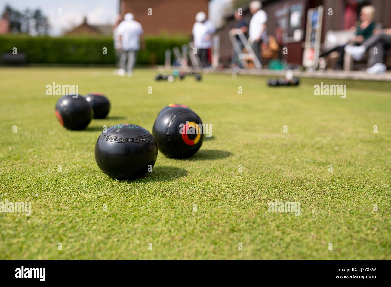 Bowls on green close up low angle british summer sport Stock Photo