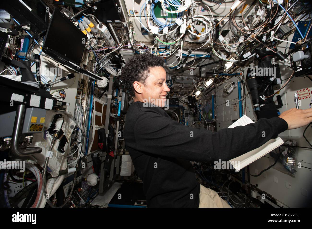 NASA astronaut and Expedition 67 Flight Engineer Jessica Watkins familiarizes herself with systems and procedures of the International Space Station following his recent arrival aboard the orbiting lab, May 1, 2022 in Earth Orbit. Stock Photo