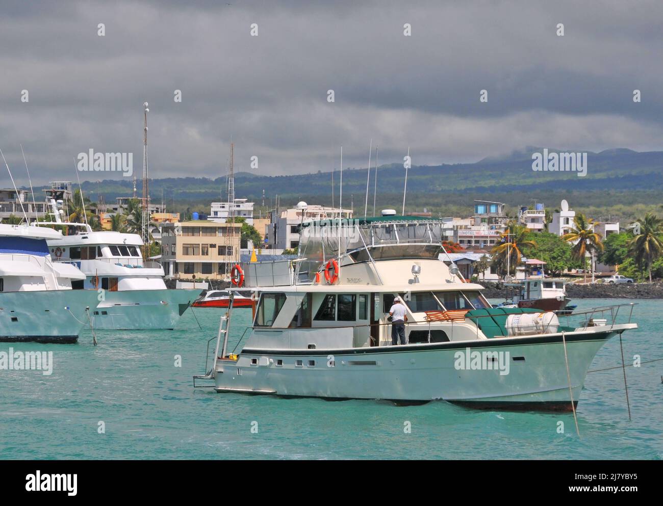 boats in Academy Bay, Puerto Isidro Ayora, Santa Cruz island, Galapagos, Ecuador Stock Photo