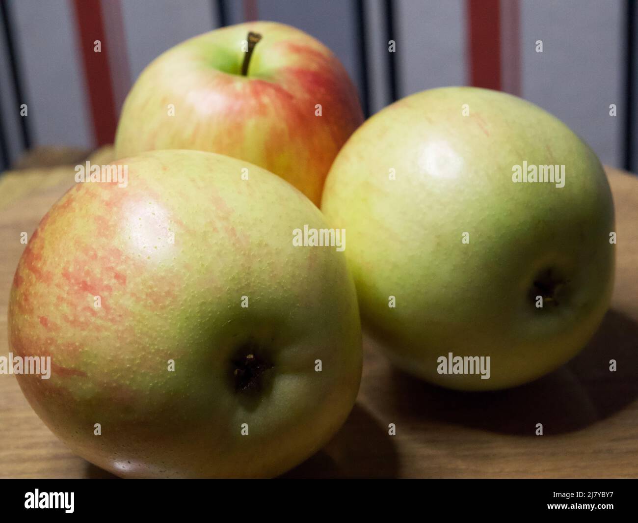 Three ripe gala apples, a closeup shot. Fruits, macro photos Stock
