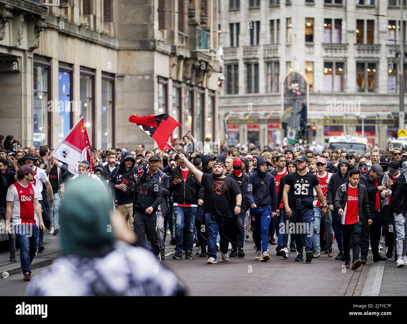 2022-05-11 18:05:21 AMSTERDAM - Ajax fans walk from Leidseplein to Central  Station, prior to the match between Ajax and sc Heerenveen. Ajax can  conquer the 36th national title. In that case, the