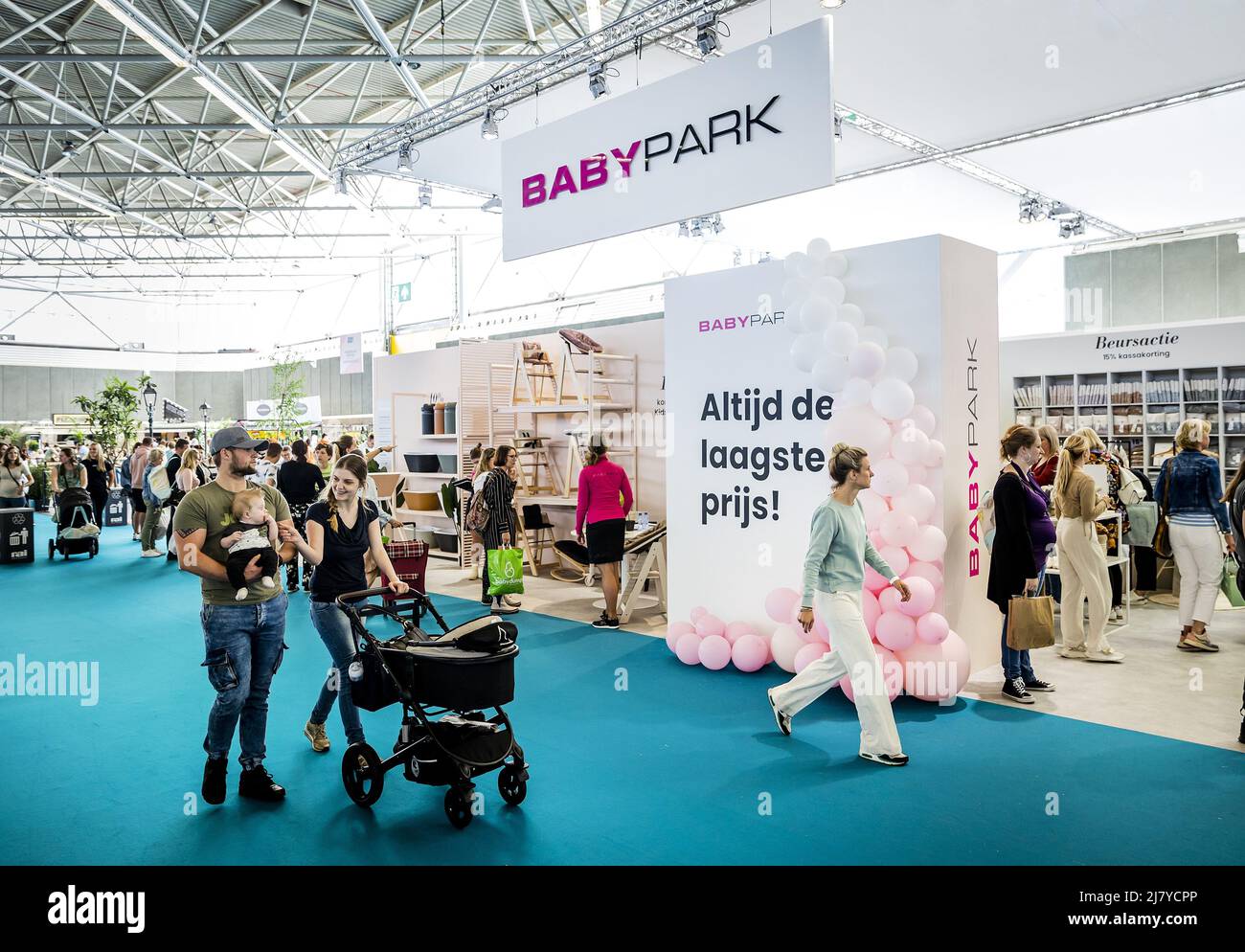 2022-05-11 15:16:08 AMSTERDAM - Visitors on the first day of the Nine Months Fair in the RAI. It is the first time since the outbreak of the corona pandemic that the fair on pregnancy and babies is taking place again. REMKO DE WAAL netherlands out - belgium out Stock Photo