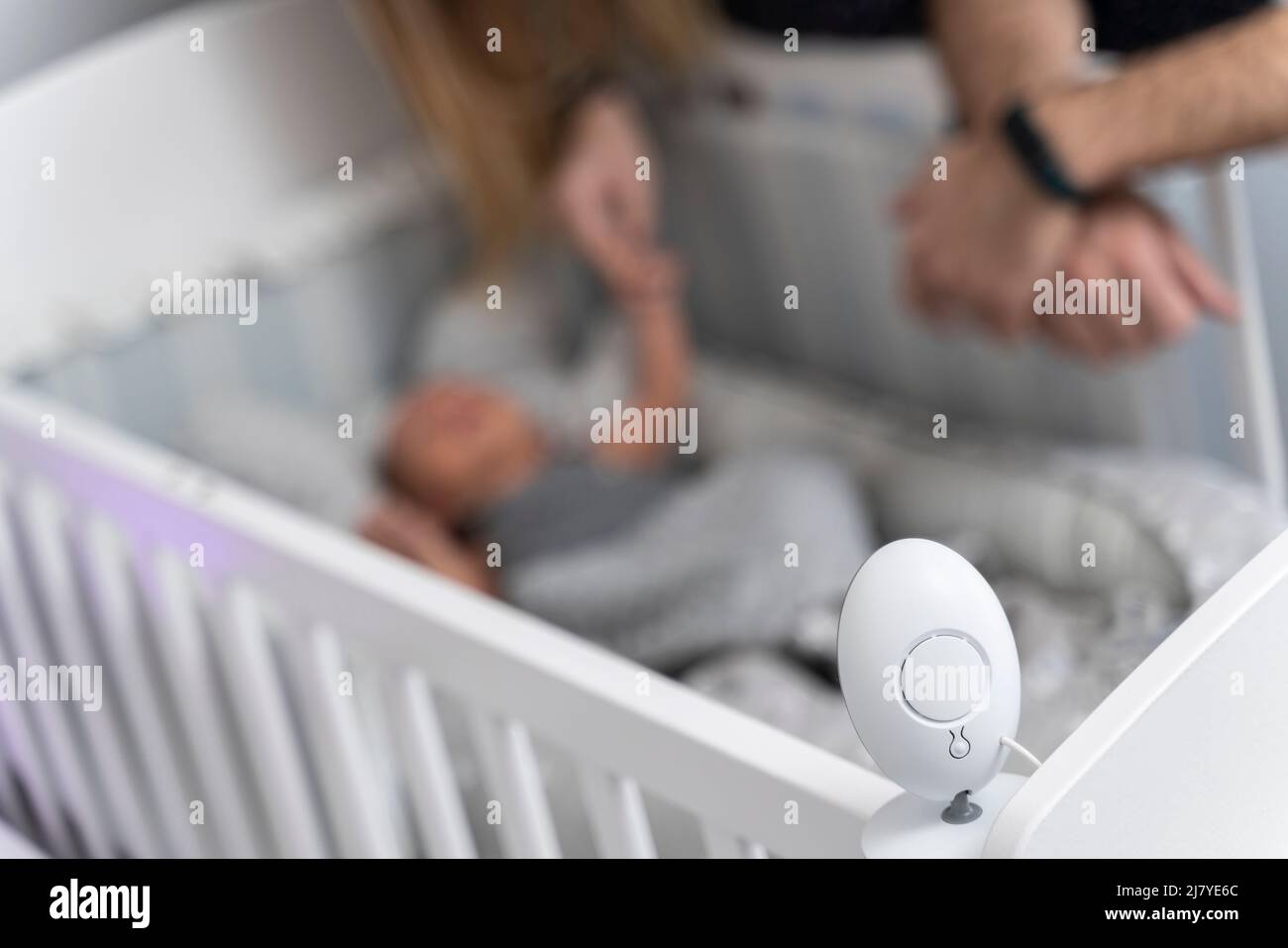 built-in baby video camera above the crib to monitor Stock Photo