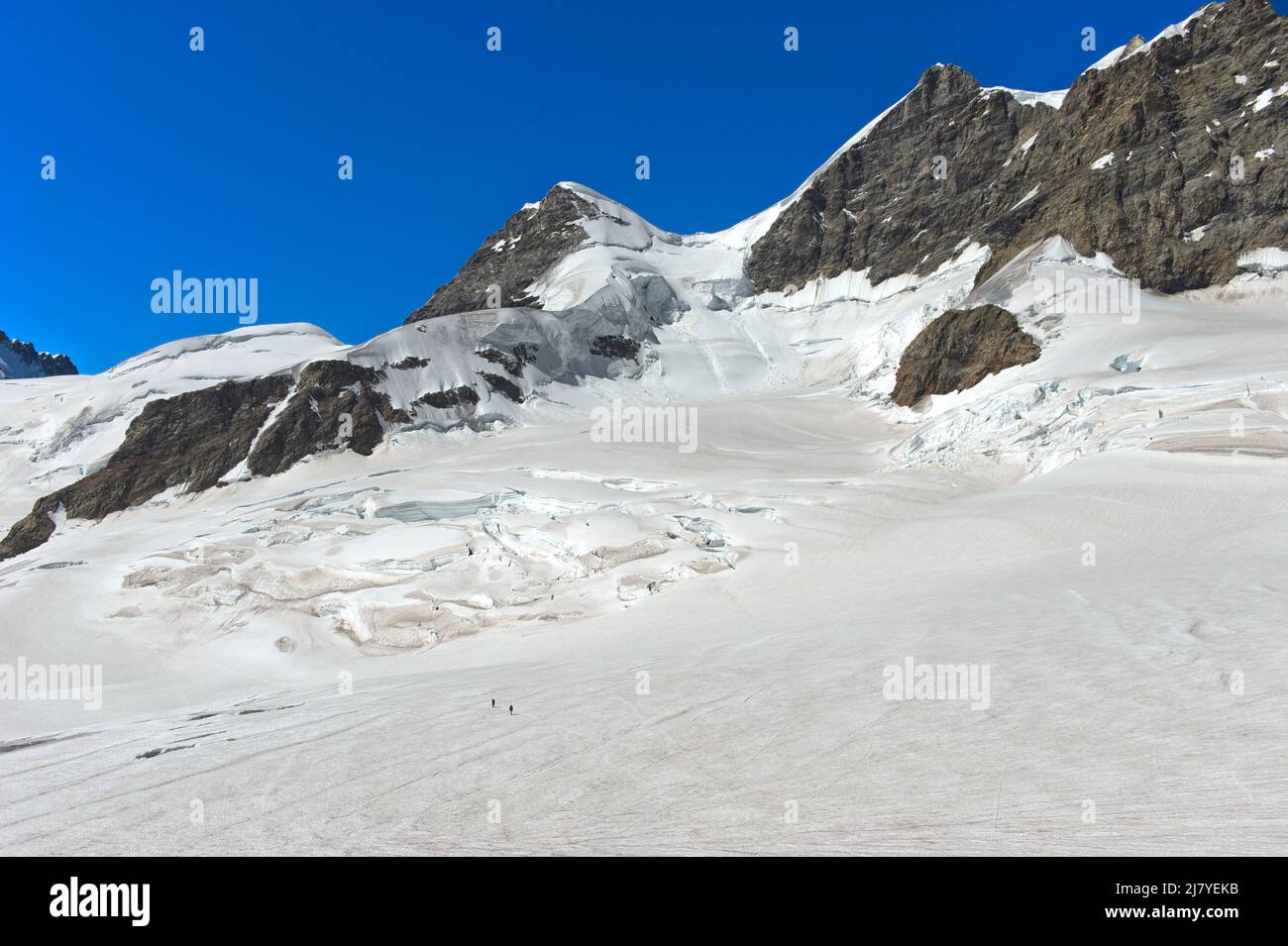 View from the Sphinx tunnel at the Jungfraujoch to the Rottalhorn and Rottalsattel, Jungfrau normal route, Grindelwald, Bernese Oberland, Switzerland Stock Photo