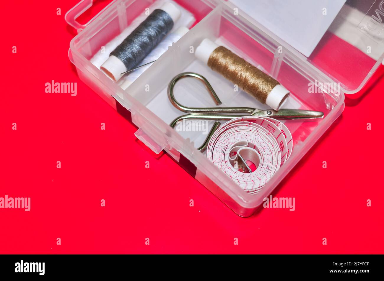 Equipment for sewing scissors tap measure and threads Stock Photo Alamy