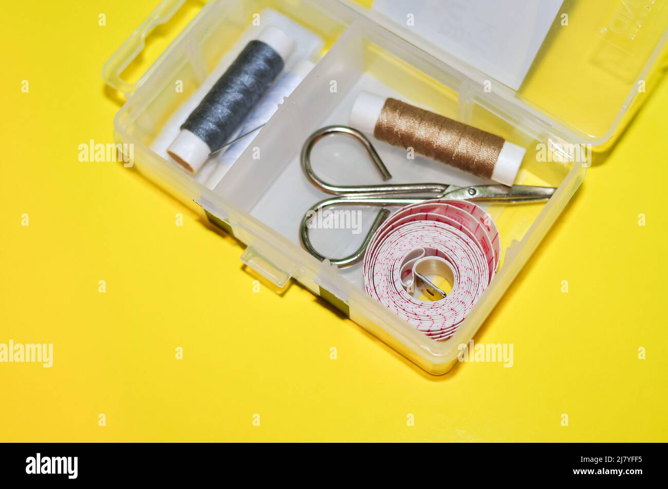 Equipment for sewing scissors tap measure and threads Stock Photo Alamy