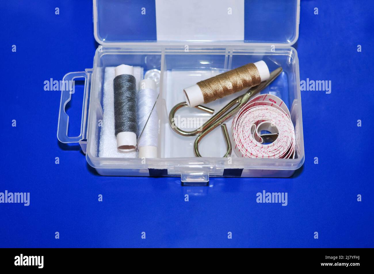 Equipment for sewing scissors tap measure and threads Stock Photo Alamy