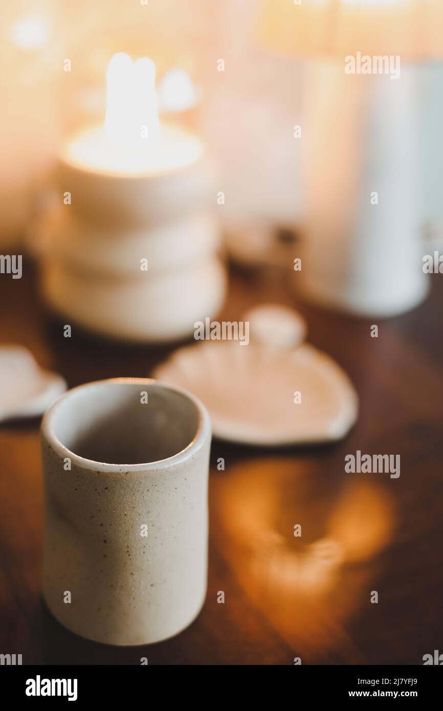 ceramic cup on a cozy warm background indoors.  Stock Photo