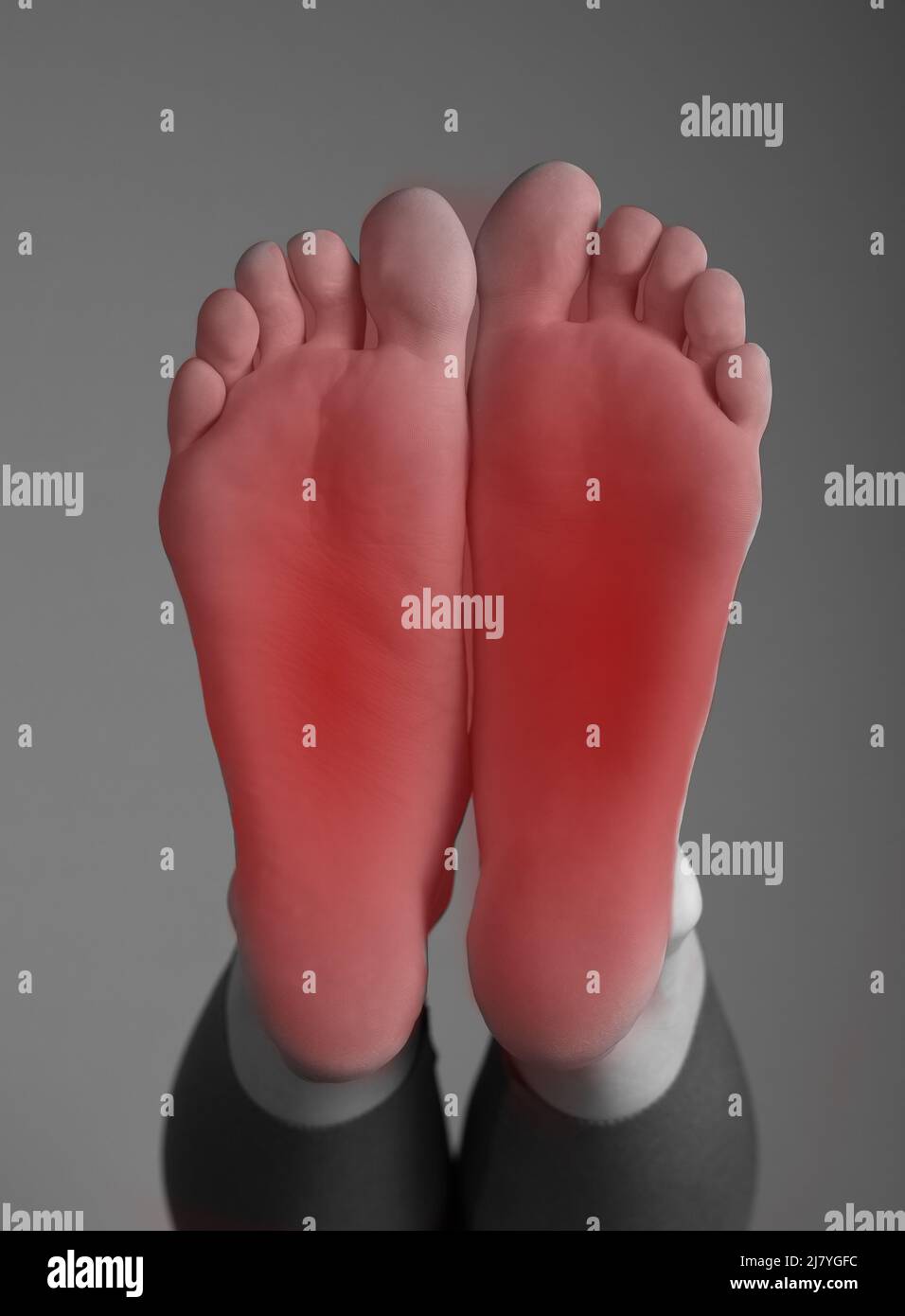 Foot pain. Woman feet with red point. Arthritis, gout, tendinitis