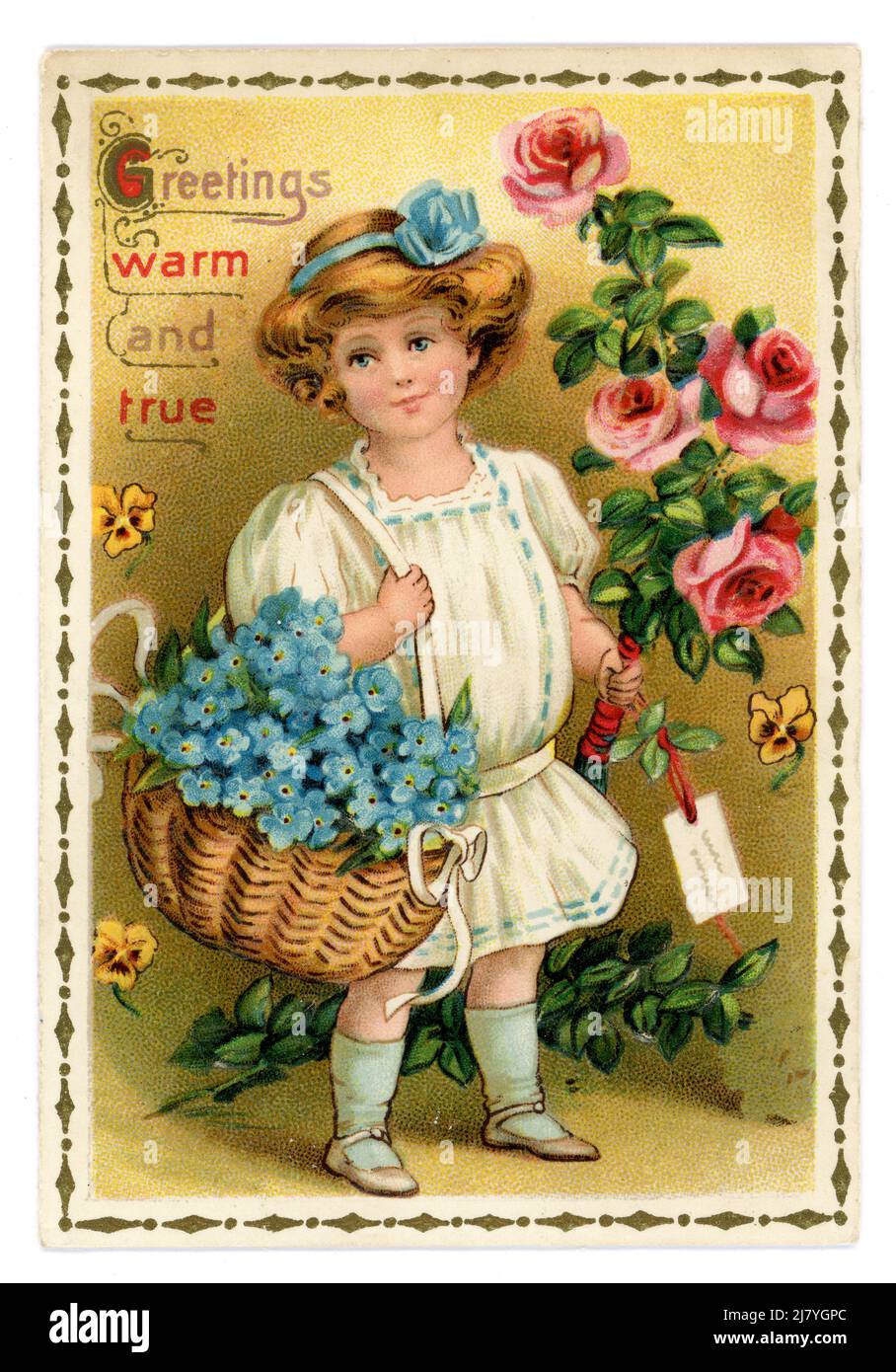 Original Edwardian sentimental greetings card, young girl holding a bunch of roses and basket of forget me not flowers, circa 1909, U.K. Stock Photo