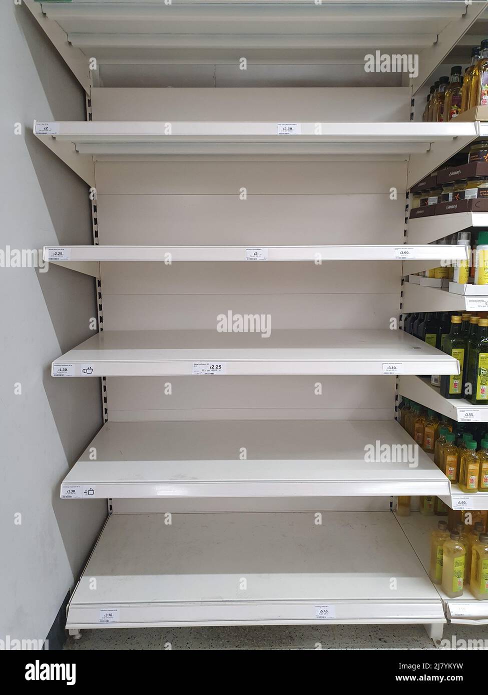 In Sainsbury's in late April no cooking oil is available. Shortages of sunflower oil due to disruption of supplies from Ukraine caused a run on it. Stock Photo