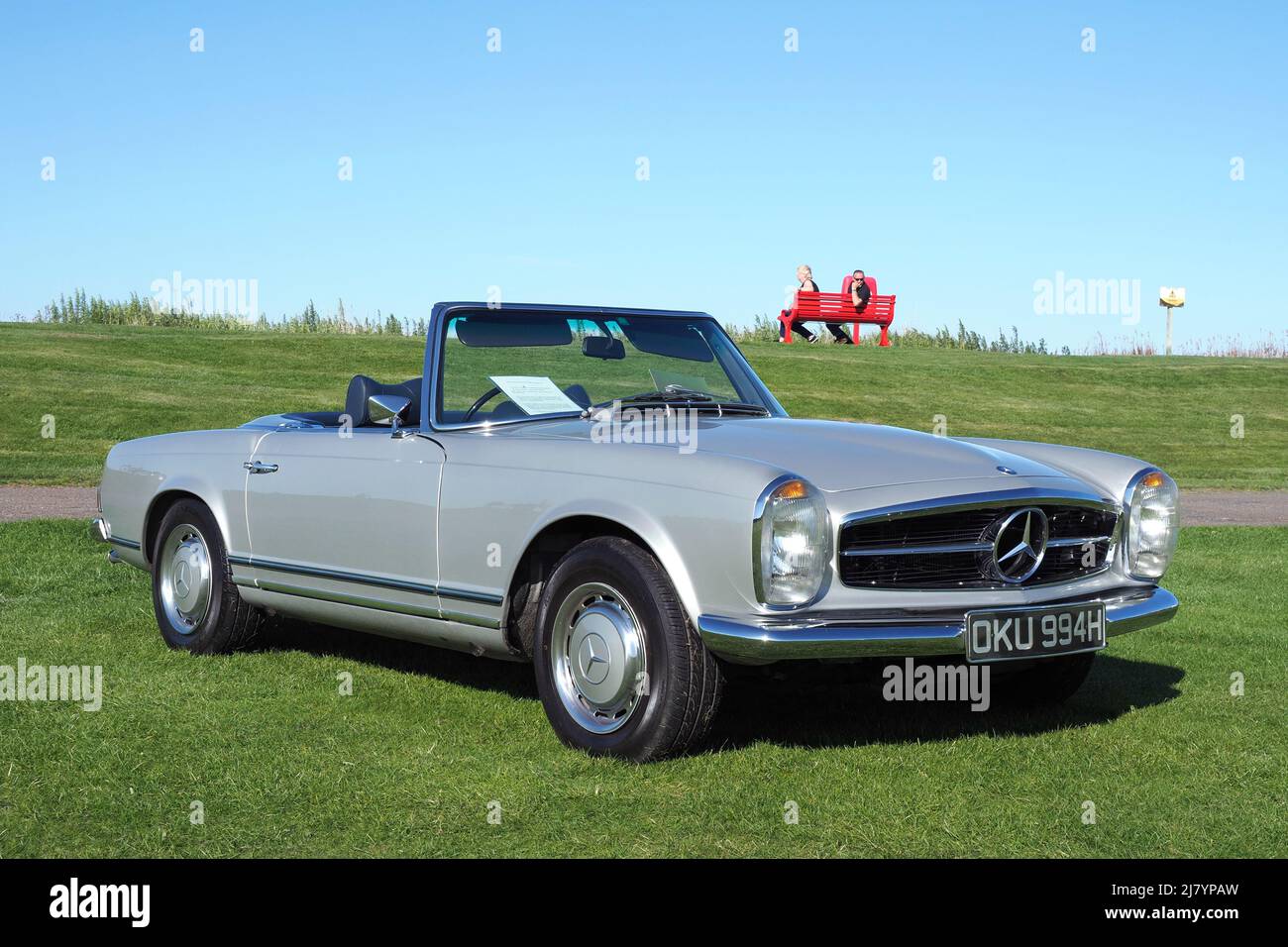 Front side view of a metallic grey silver, Mercedes Benz, W113, SL280