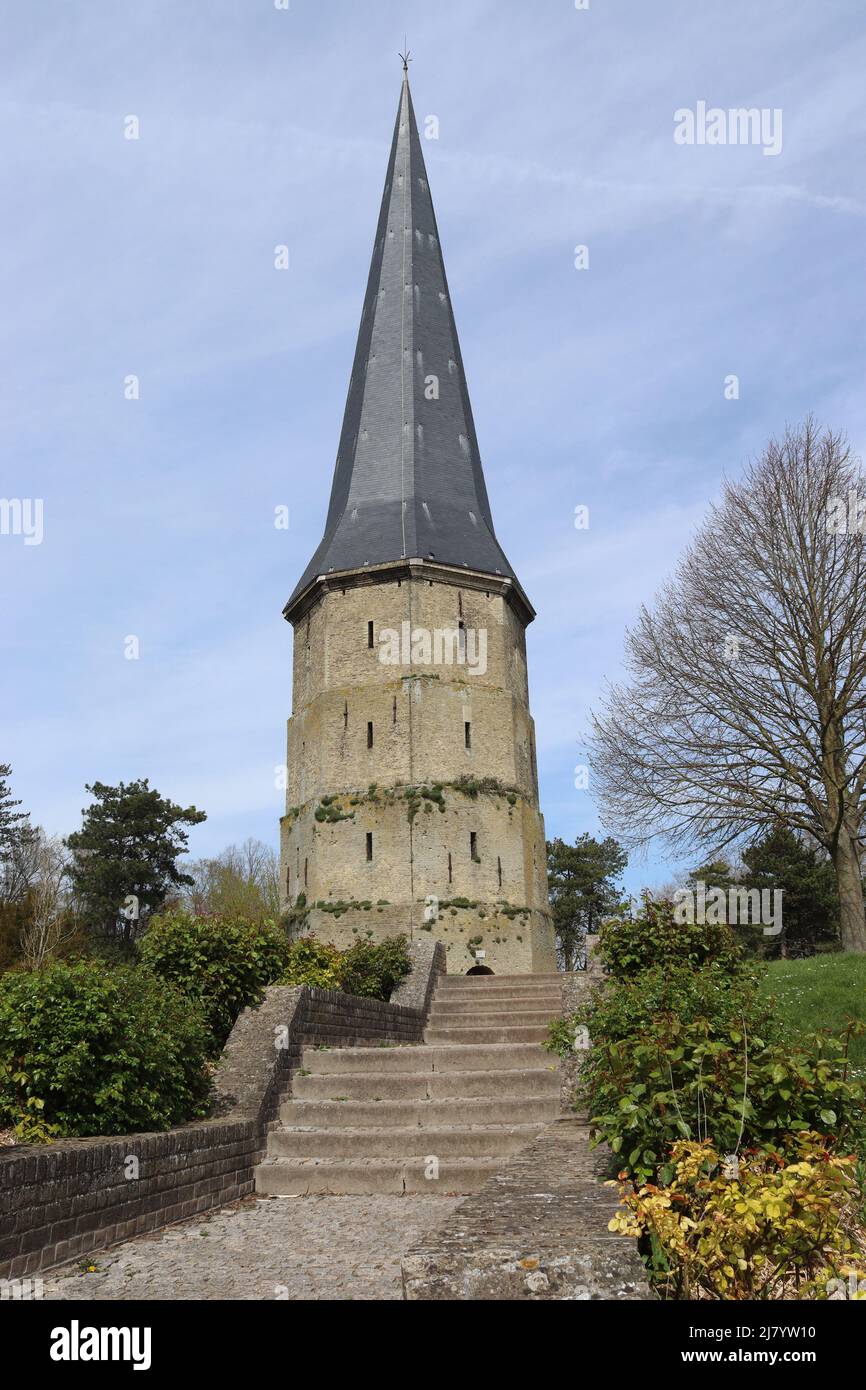 View of the Tour Pointue of the former Benedictine abbey of St Winnoc in Bergues, Nord, France, on a sunny spring day. The tower is now part of a publ Stock Photo
