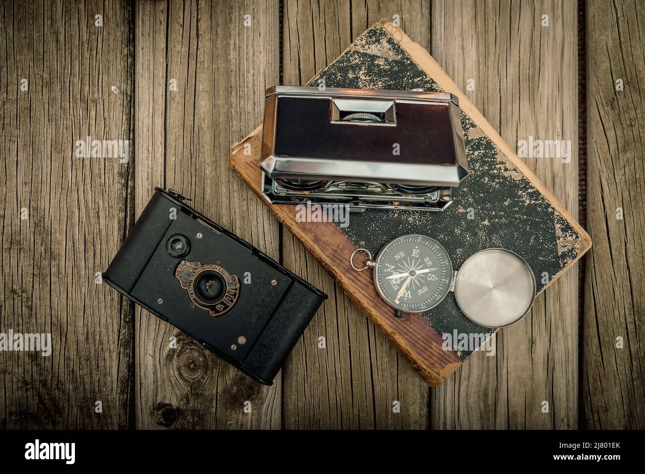 vintage travel memories concept. Old camera, binoculars, letters and