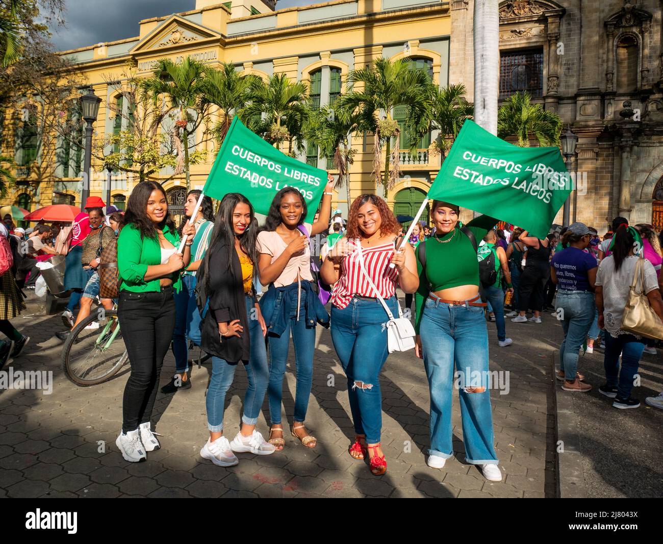 Medellin, Antioquia, Colombia - March 8 2022: Women Holding Green Flags  with the Message: 'Free Bodies, Secular States' for the Women's Day  Feminist Stock Photo