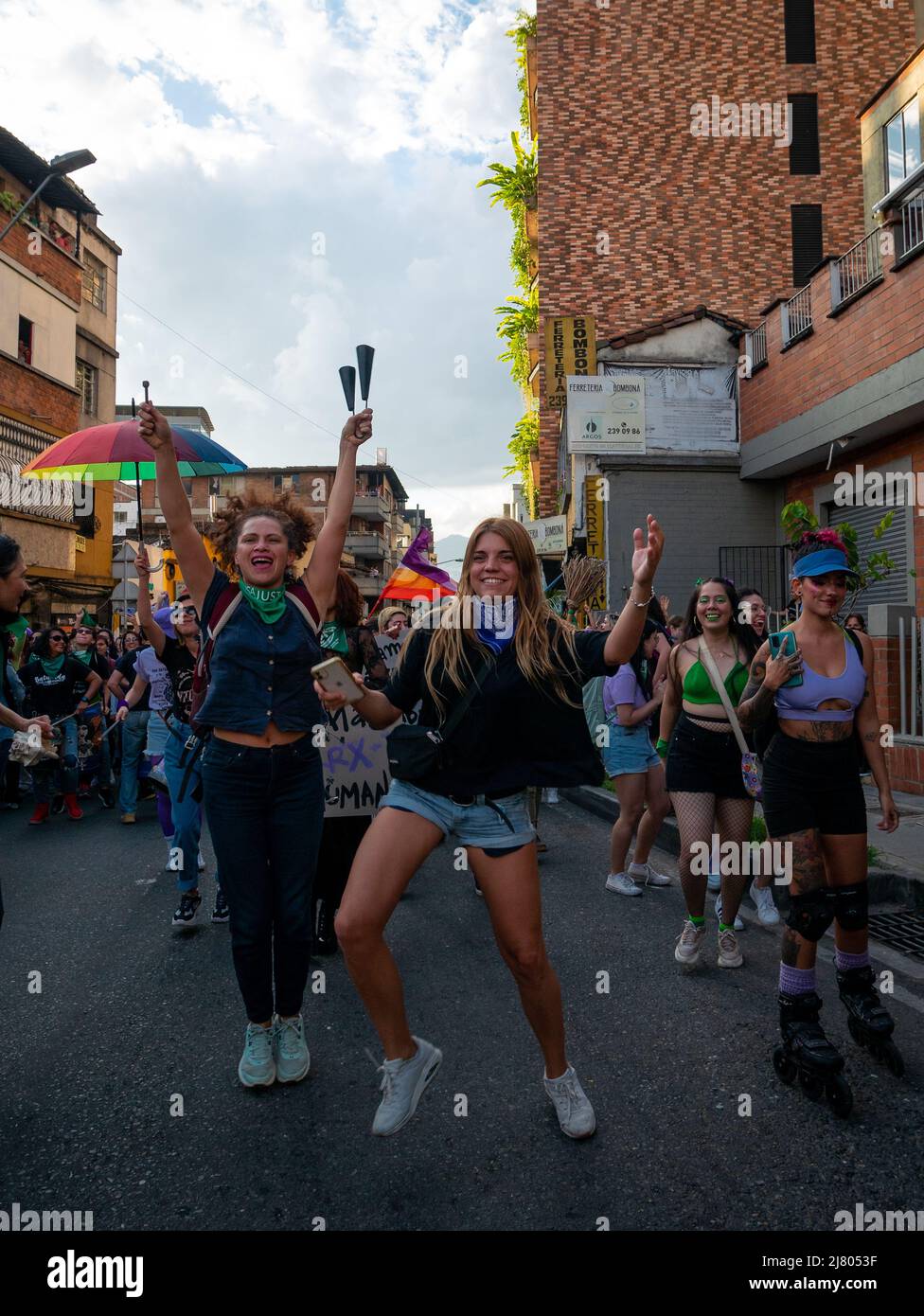 Medellin, Antioquia, Colombia - March 8 2022: Women Dressed in Purple or Green Dancing, Marching and Protesting During Woman's Day Stock Photo