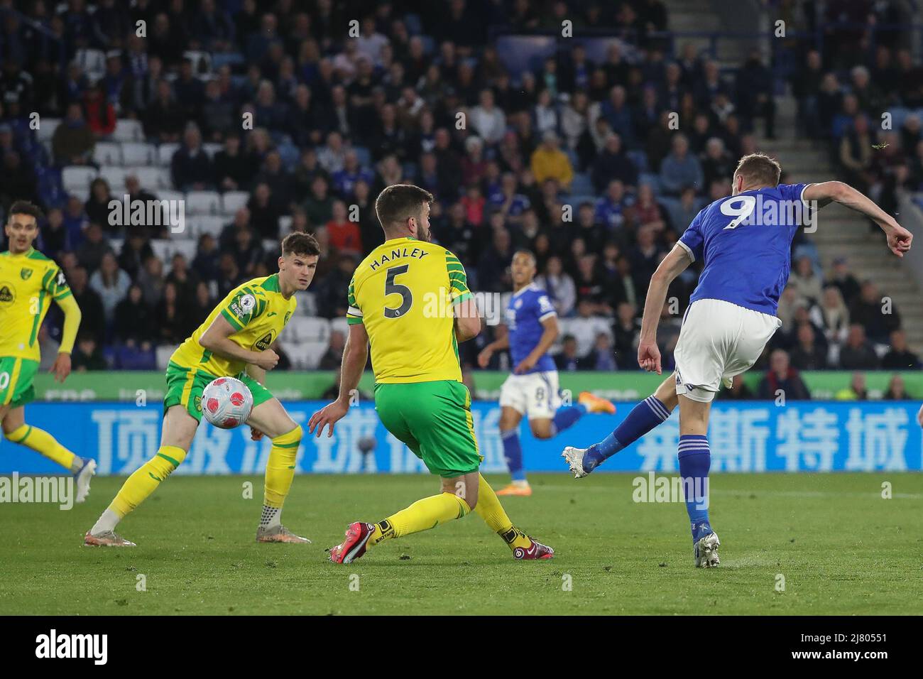 Jamie Vardy #9 of Leicester City takes a shot which deflects off Grant Hanley #5 of Norwich City and goes in to make it 1-0 Stock Photo