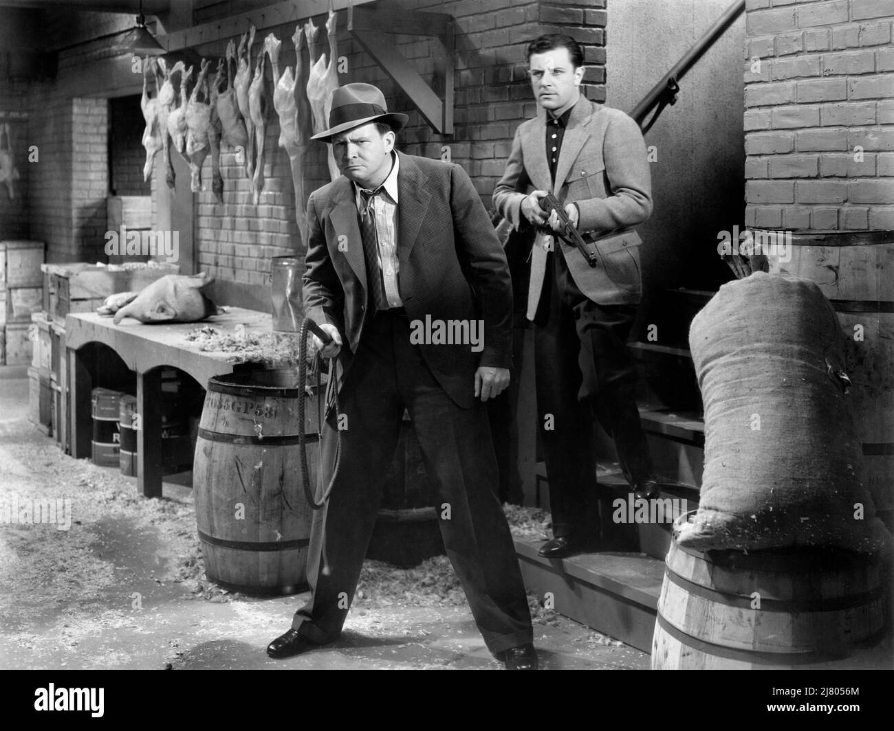 Barton McLane, Warren Hull, on-set of the Film, "Bengal Tiger", Warner Bros., 1936 Stock Photo