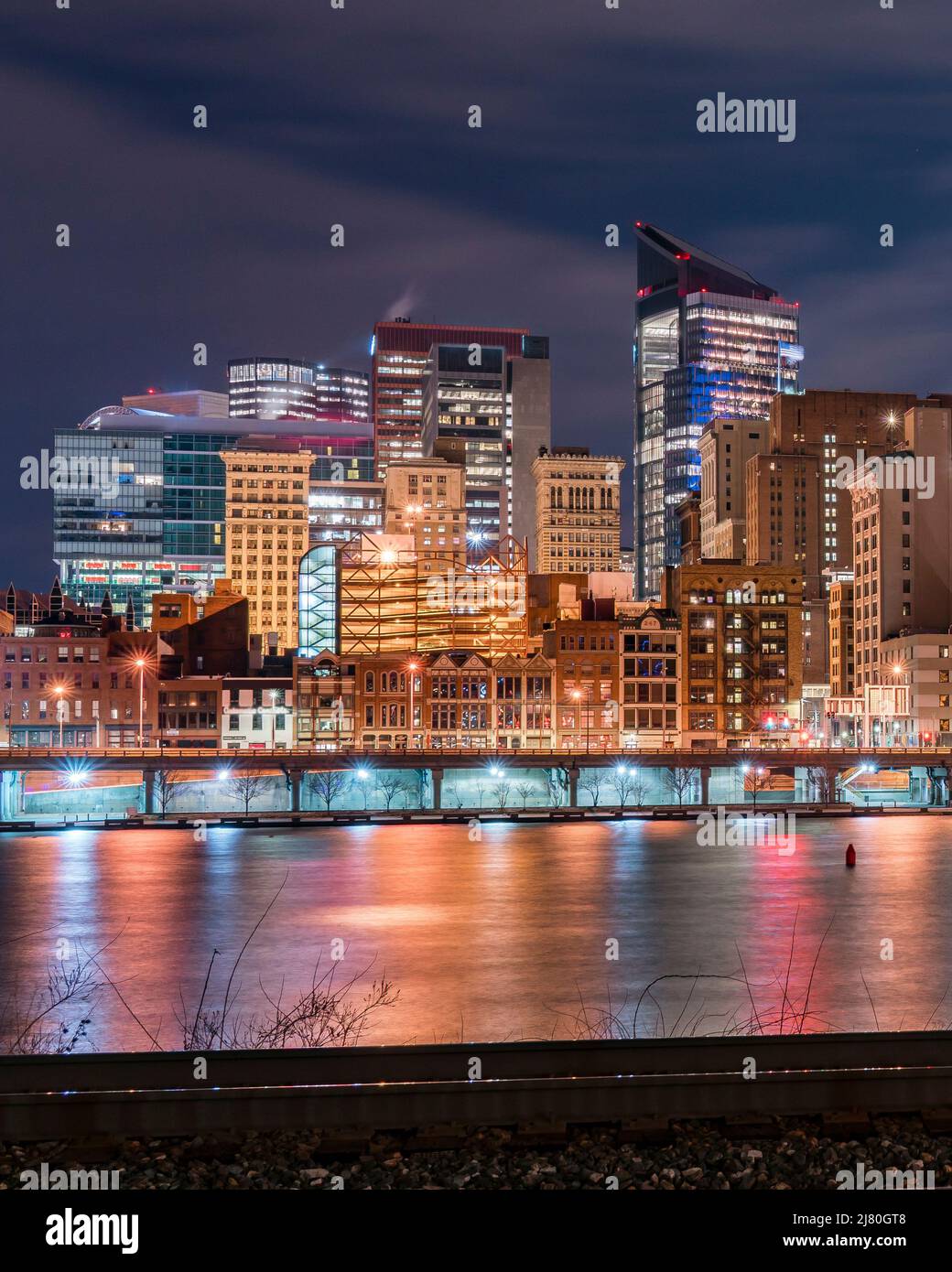 Downtown Pittsburgh city skyline illuminated at night, Pennsylvania, USA Stock Photo