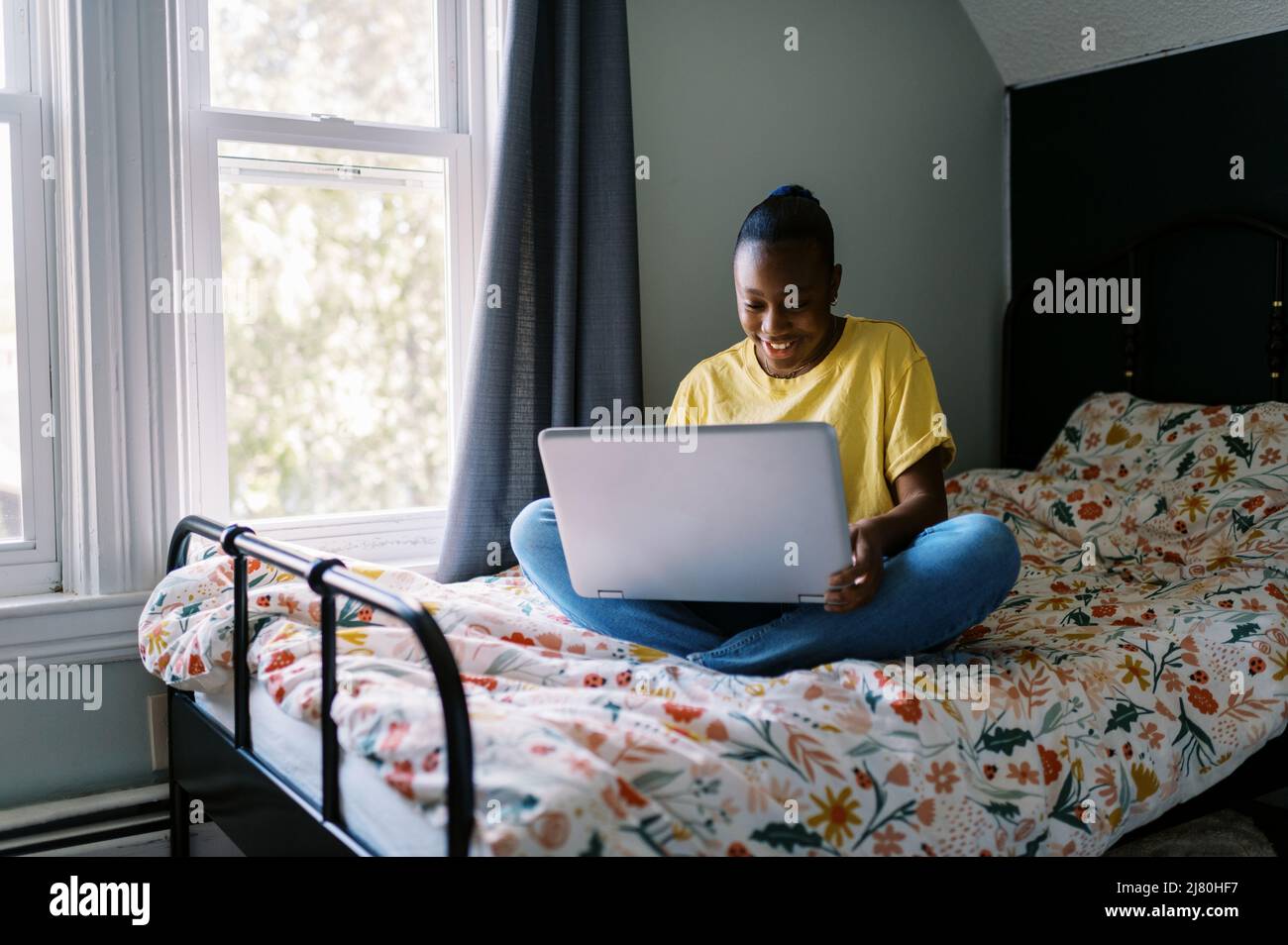 African teen girl laptop hi-res stock photography and images - Alamy