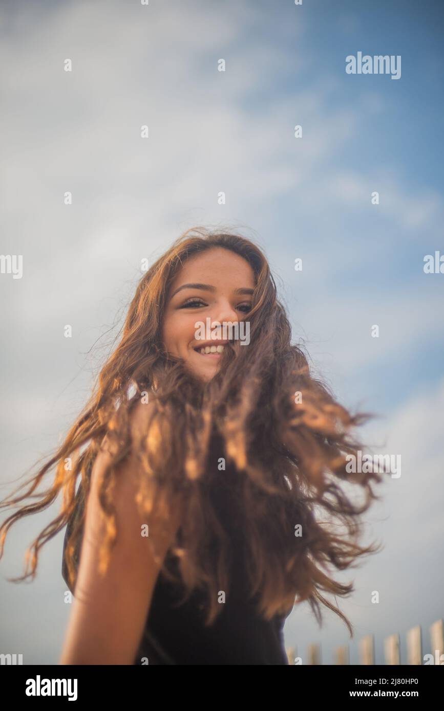 Feeling alive and beautiful on the beach Stock Photo