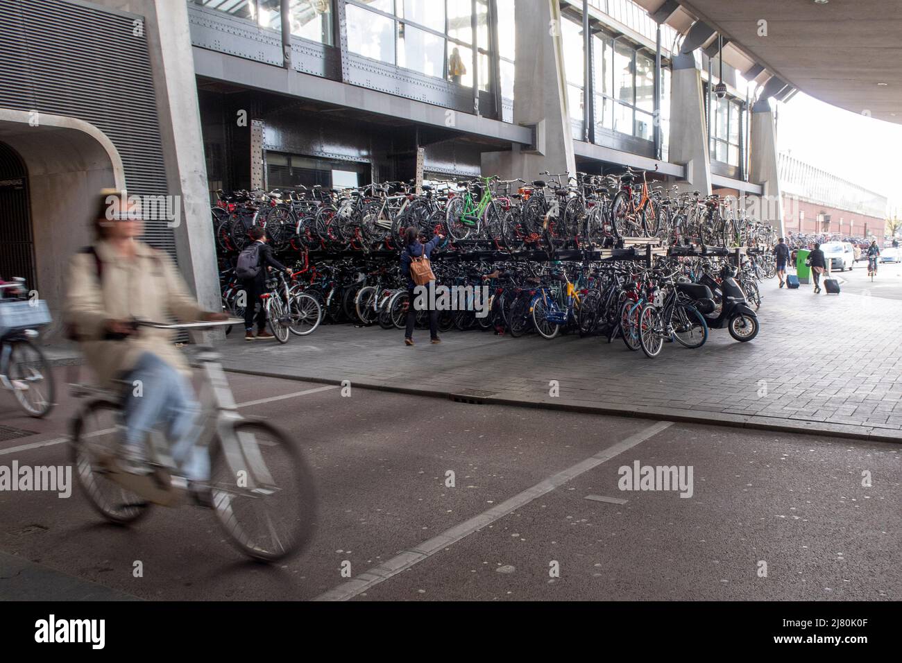 Bicycle parking facilities at the Amsterdam Centraal Train Station in Amsterdam, The Netherlands, Europe Stock Photo