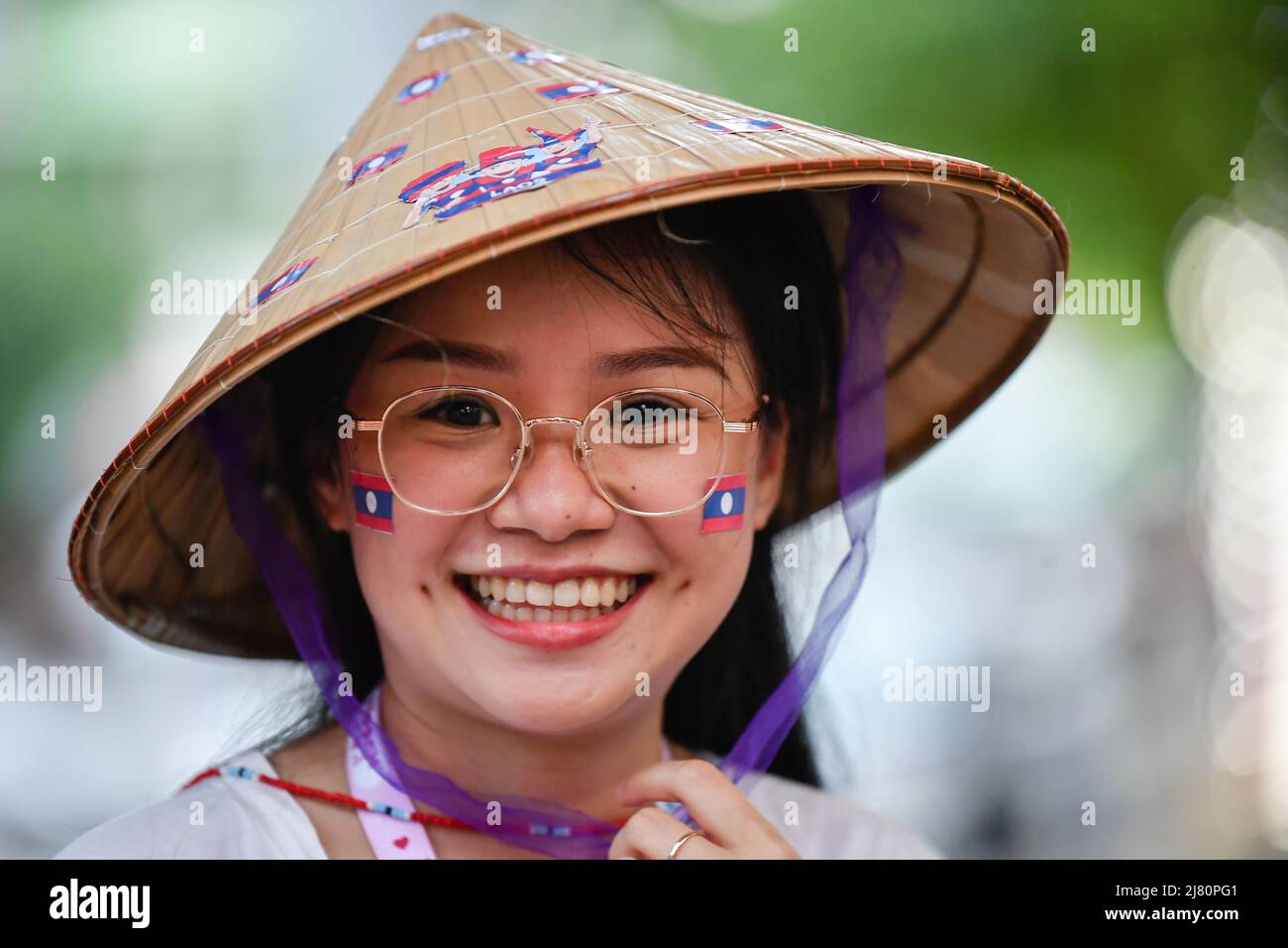 Laos fans cheer during the Sea Games 2022 Group B match between