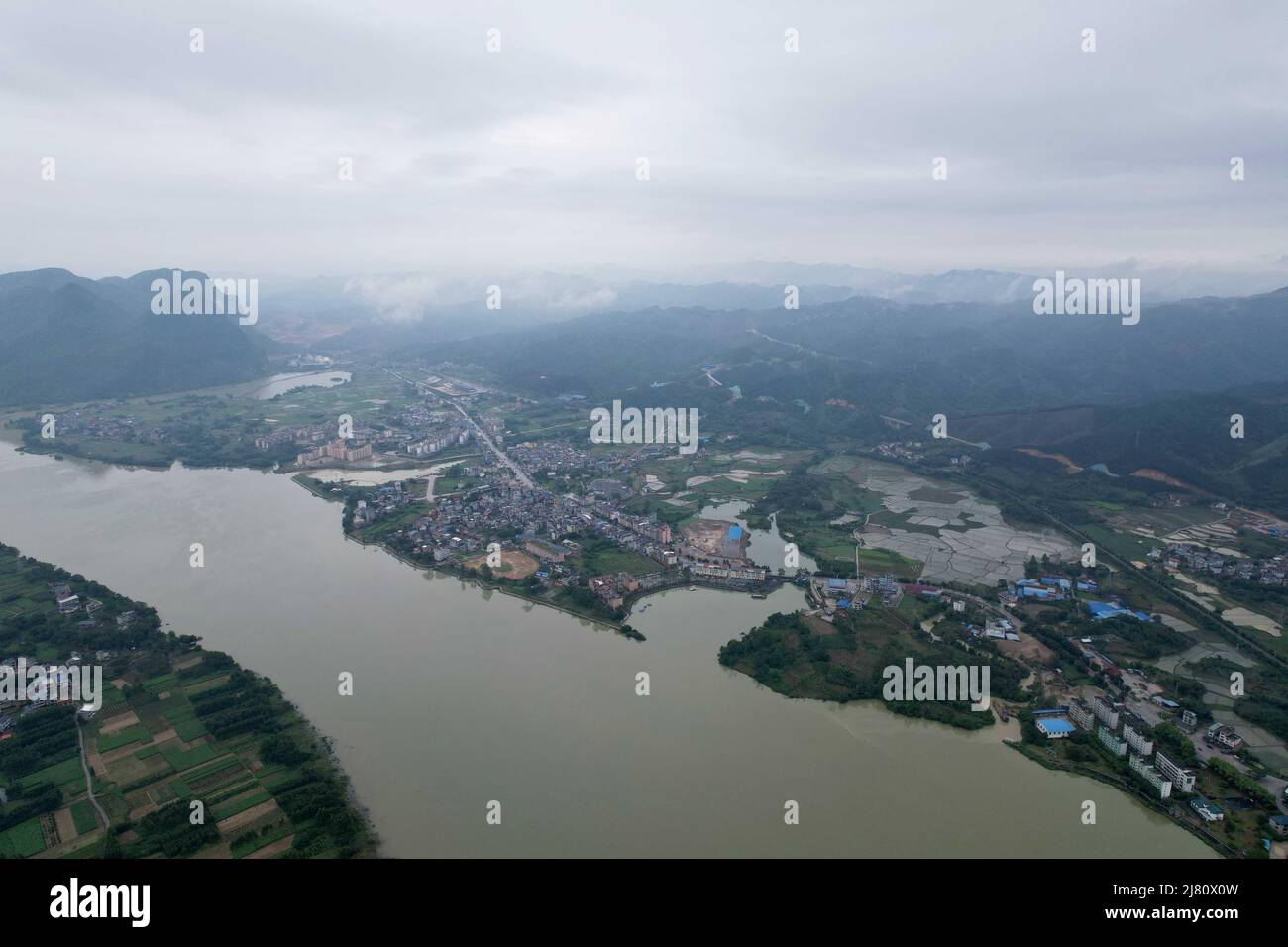 LIUZHOU, CHINA - MAY 11, 2022 - An aerial photo taken with an unmanned aerial vehicle shows the rising water level on the upper reaches of the Pearl R Stock Photo