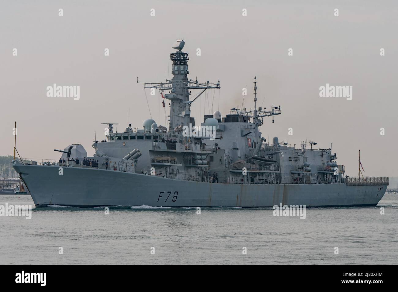 The Type 23 (Duke Class) frigate HMS Kent (F78) leaving Portsmouth Harbour, UK on the afternoon of the 9th May 2022. Stock Photo