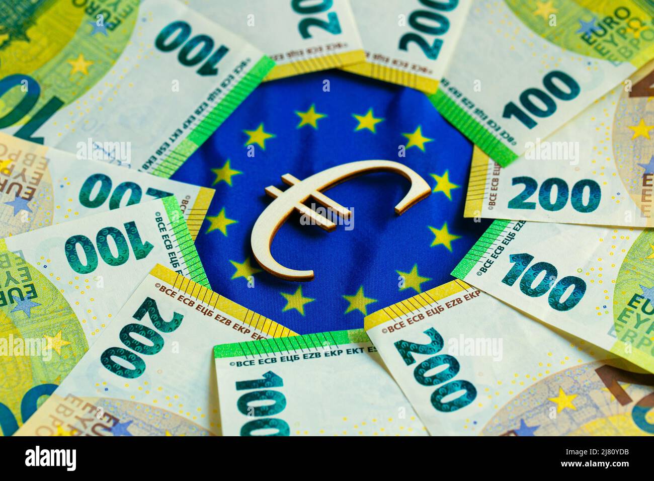 Euro exchange rate. euro bills and the sign on the flag of the